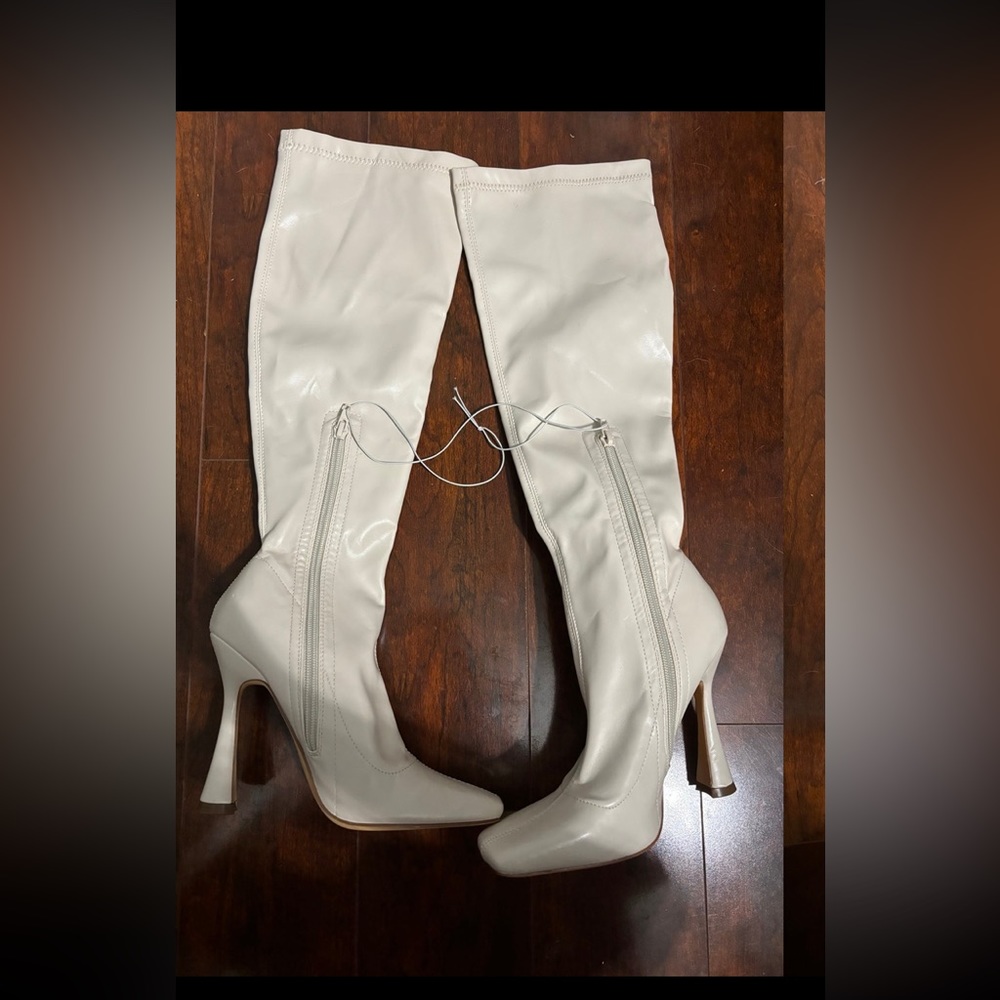 White knee high boots